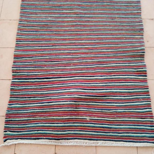 Tapis en laine multicolore fait main